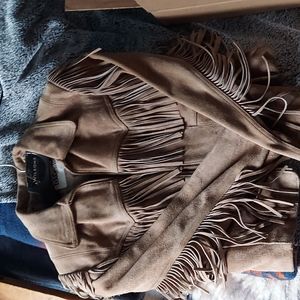 Beautiful Wilson's tan genuine leather fringed jacket. Size 14.